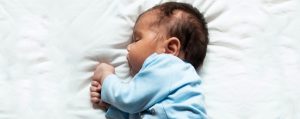 Close-up of a newborn baby sleeping.